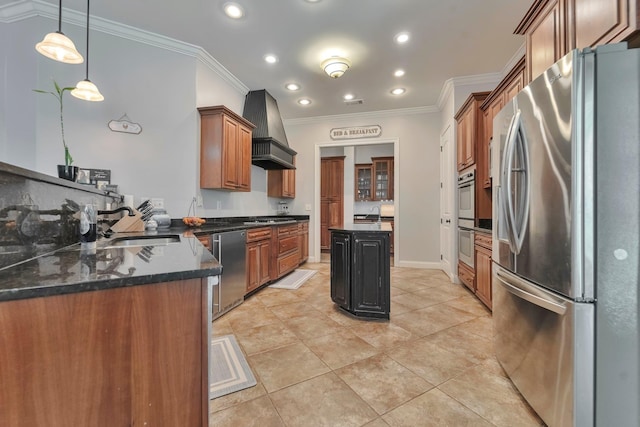 kitchen with brown cabinetry, premium range hood, stainless steel appliances, and crown molding