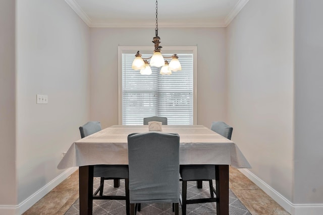 dining area featuring an inviting chandelier, baseboards, and ornamental molding