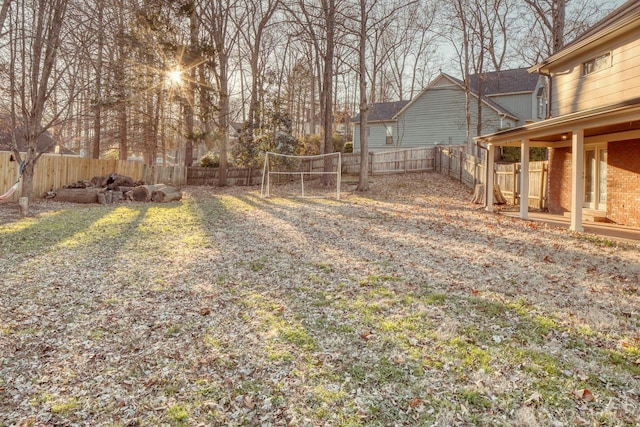 view of yard with a fenced backyard