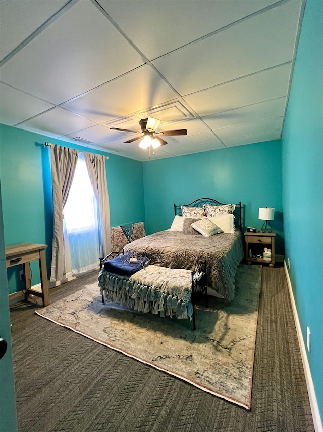 bedroom featuring carpet floors, baseboards, and a ceiling fan