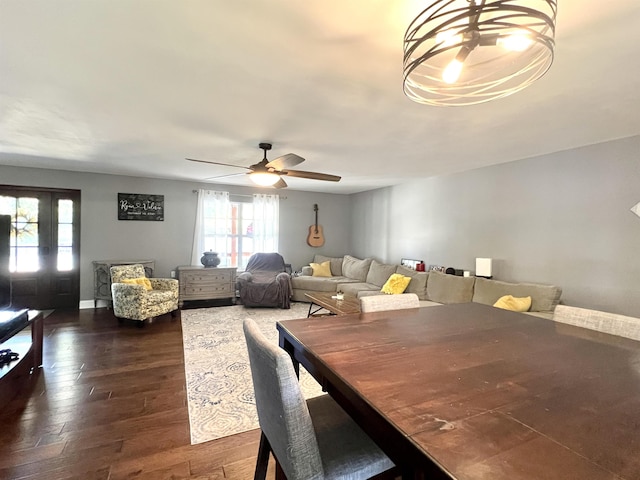 dining room featuring dark wood finished floors and a ceiling fan