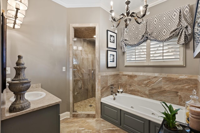 full bath featuring a stall shower, a jetted tub, an inviting chandelier, crown molding, and vanity