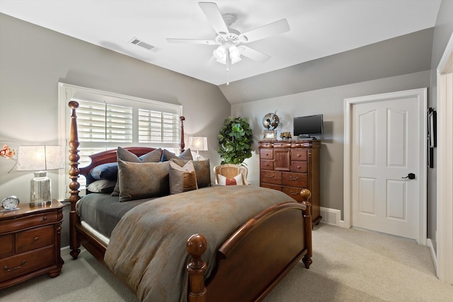 bedroom with baseboards, visible vents, light colored carpet, lofted ceiling, and ceiling fan