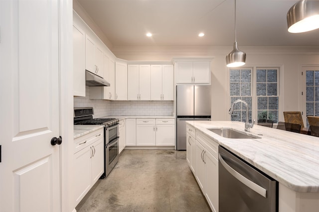 kitchen featuring decorative backsplash, appliances with stainless steel finishes, white cabinets, a sink, and under cabinet range hood