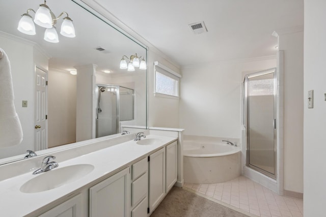 bathroom featuring tile patterned flooring, a shower stall, and a sink