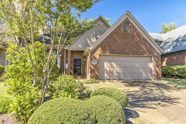 1923 Rye Rd, Germantown, TN 38139 - traditional-style home with an attached garage, driveway, and brick siding