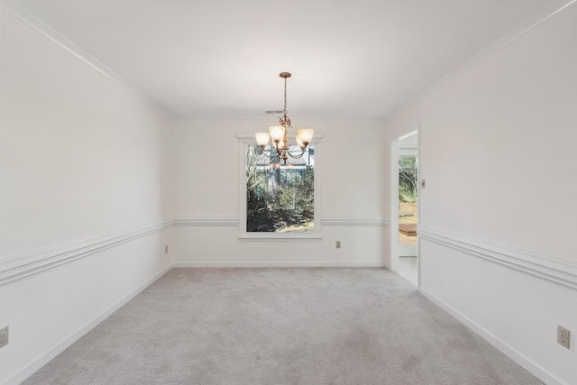 empty room with light colored carpet, crown molding, baseboards, and an inviting chandelier