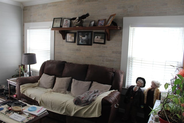 living room featuring ornamental molding and plenty of natural light