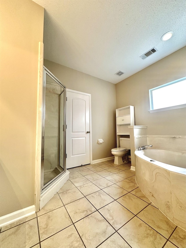 full bath with tile patterned flooring, visible vents, a shower stall, and toilet