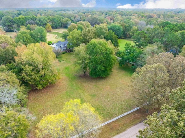 drone / aerial view with a view of trees