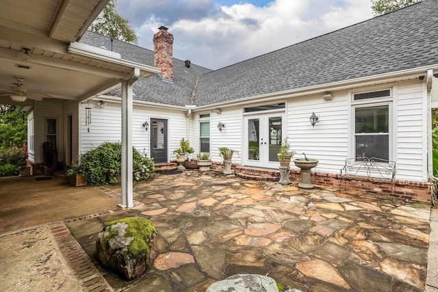 view of patio / terrace featuring a ceiling fan, entry steps, and french doors