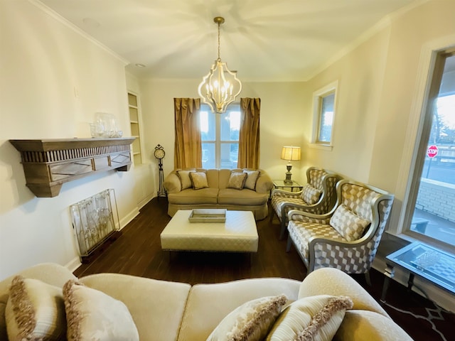 living area featuring crown molding, wood finished floors, a wealth of natural light, and a chandelier