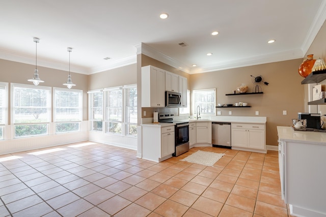 kitchen featuring appliances with stainless steel finishes, light tile patterned floors, a sink, and open shelves