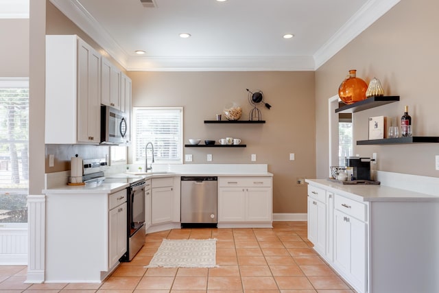 kitchen with crown molding, light tile patterned floors, open shelves, appliances with stainless steel finishes, and a sink