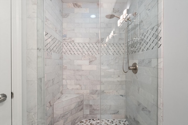 full bathroom featuring a stall shower