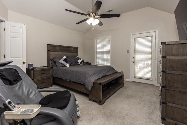 bedroom featuring lofted ceiling, a ceiling fan, visible vents, and light colored carpet