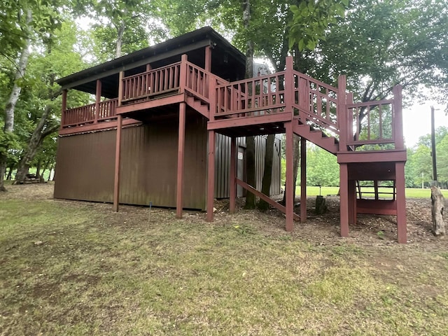 exterior space featuring a wooden deck and stairs