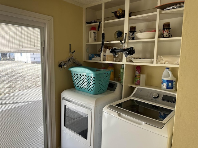 washroom with washer and dryer and laundry area