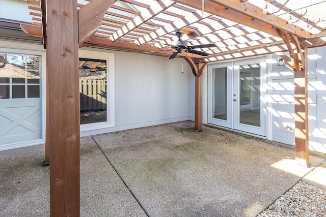 view of patio featuring ceiling fan, a pergola, and french doors