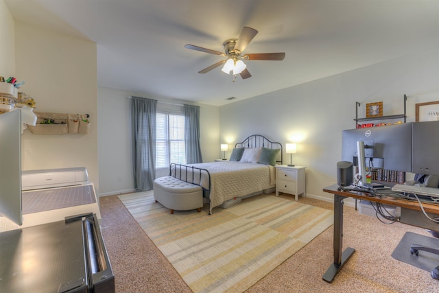 bedroom featuring ceiling fan, carpet floors, and baseboards