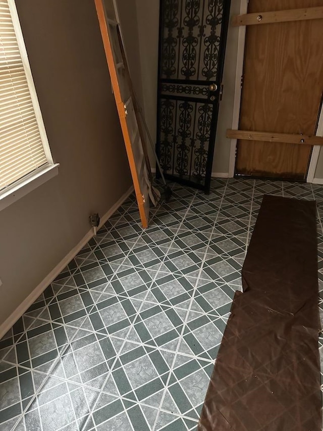 empty room with baseboards