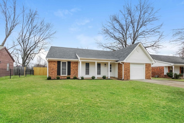 ranch-style house with driveway, brick siding, an attached garage, fence, and a front yard