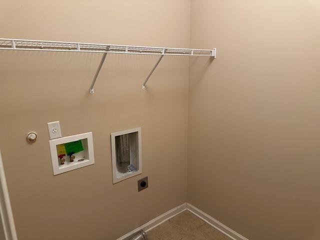 clothes washing area featuring baseboards, laundry area, washer hookup, and hookup for an electric dryer