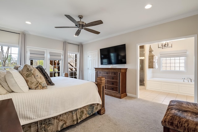 bedroom with connected bathroom, recessed lighting, light colored carpet, and crown molding