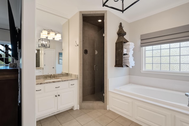 full bath with vanity, a shower stall, a bath, and tile patterned floors