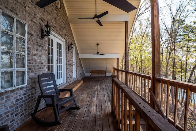 deck featuring french doors and ceiling fan