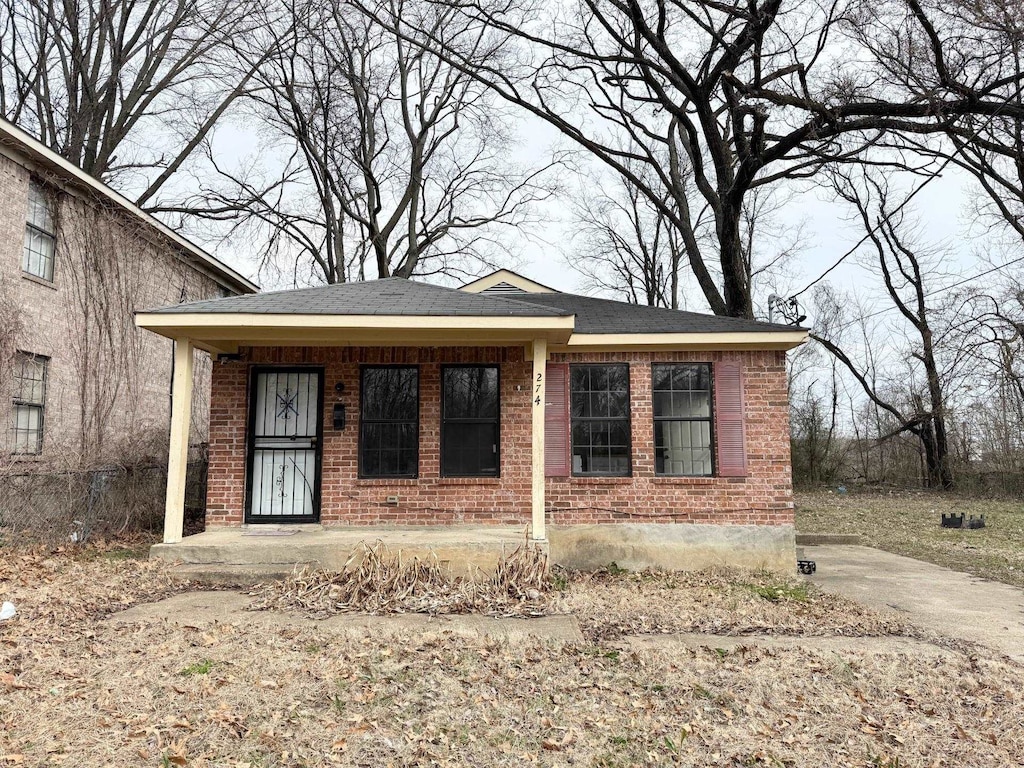 bungalow with brick siding