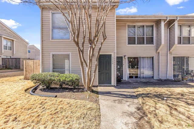 view of front of house with fence