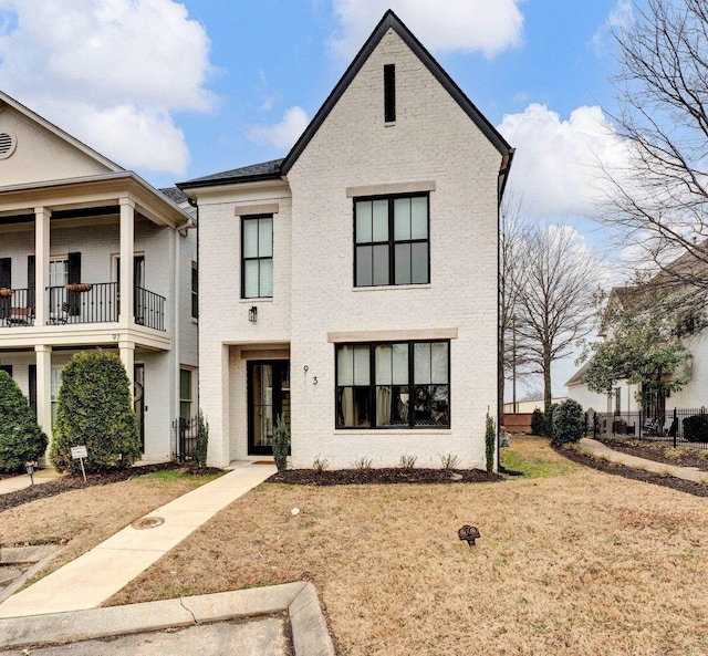 view of front of home with brick siding