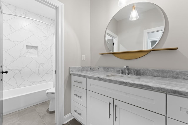 bathroom with vanity, toilet, and bathing tub / shower combination