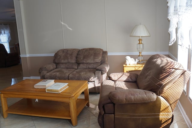 living room with tile patterned flooring