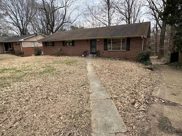 ranch-style home with brick siding