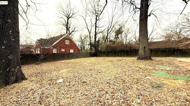 view of yard with fence