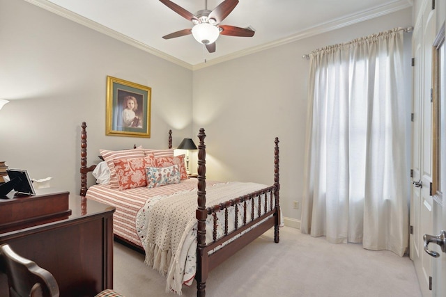 bedroom featuring light carpet, baseboards, a ceiling fan, and crown molding