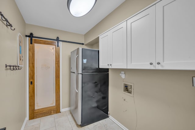 bathroom with baseboards and tile patterned floors