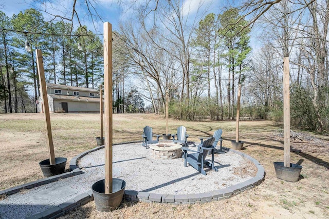 view of yard featuring a fire pit