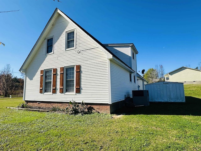 view of property exterior with a yard