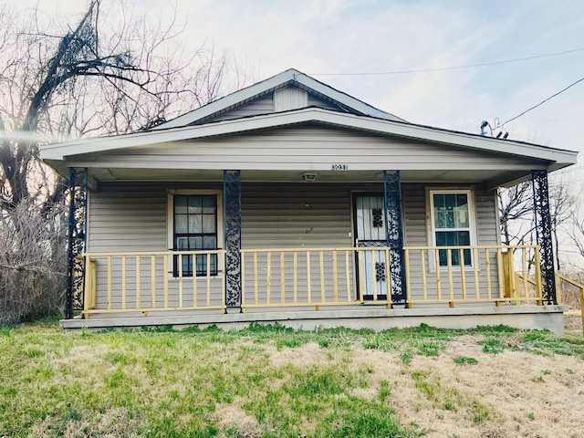 back of house with covered porch