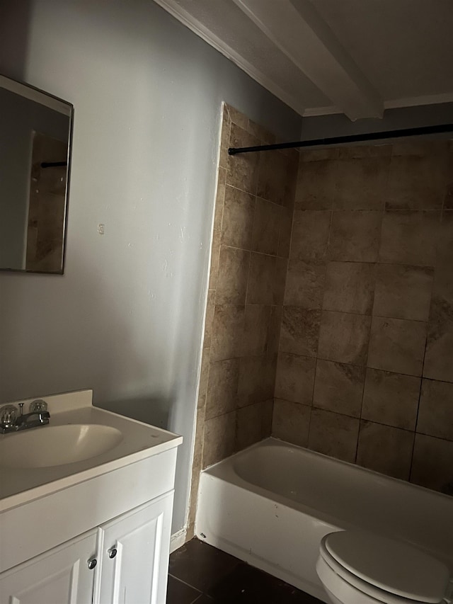 bathroom with toilet, tile patterned flooring,  shower combination, and vanity