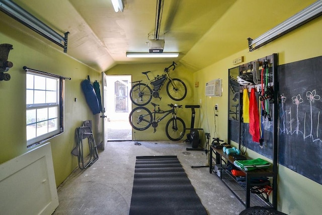 garage featuring an AC wall unit