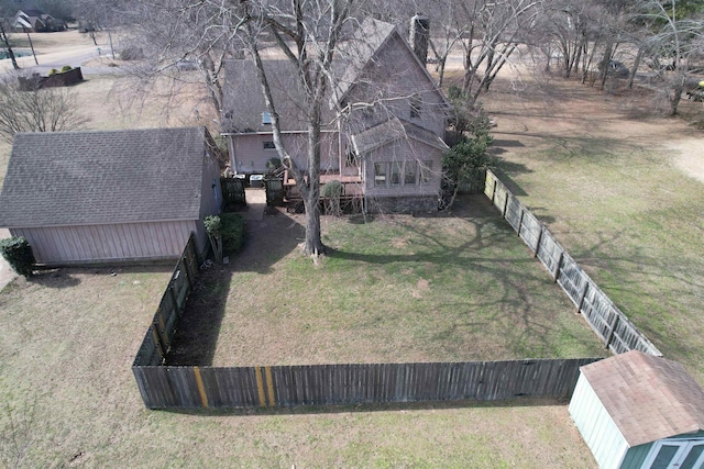 view of yard with an outbuilding and a fenced backyard