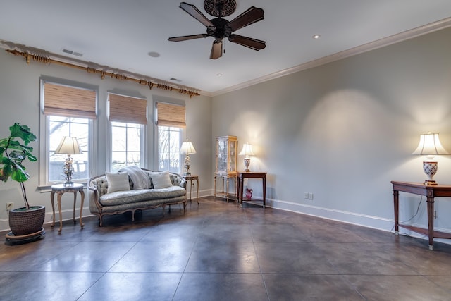 living area with ceiling fan, ornamental molding, visible vents, and baseboards