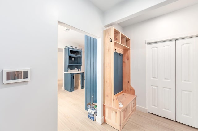 mudroom featuring light wood-type flooring