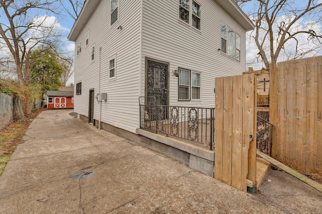 view of side of property with fence