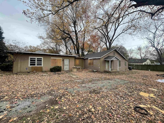 view of front of property with fence