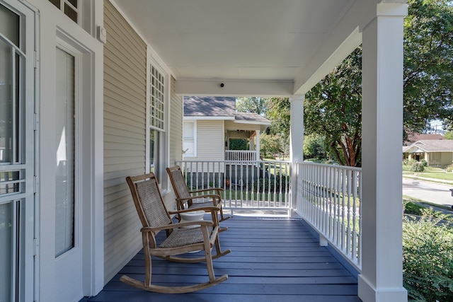 wooden deck with a porch